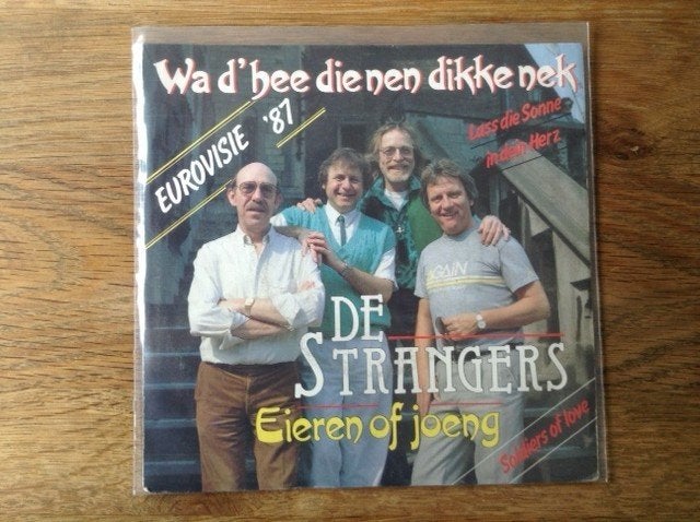 single de strangers, En néerlandais, Enlèvement ou Envoi, 7 pouces, Housse de protection extérieure
