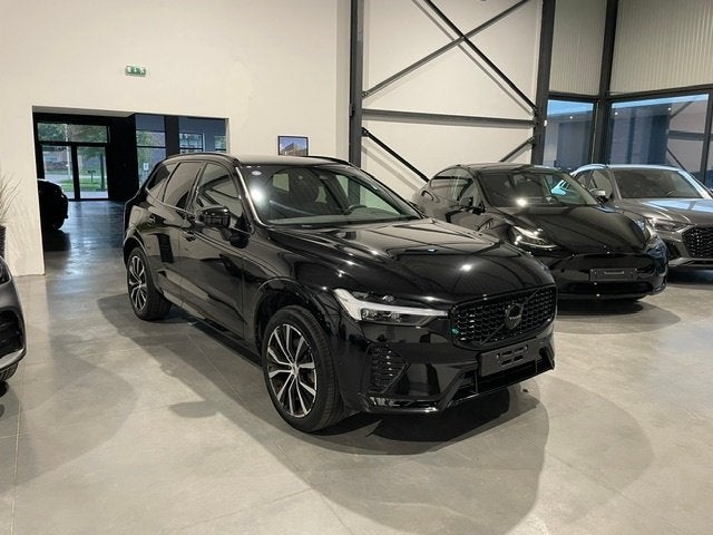 Volvo XC60 2.0i Recharge R-Design '24 met Garantie, Auto's, Lichtsensor, 4 cilinders, Zwart, Leder