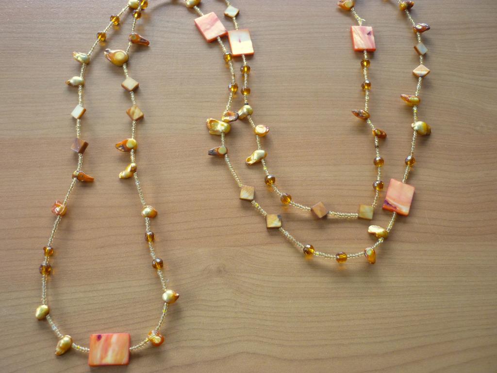 Lange oranje gouden ketting parelmoer abalone zeeschelp, Ophalen of Verzenden