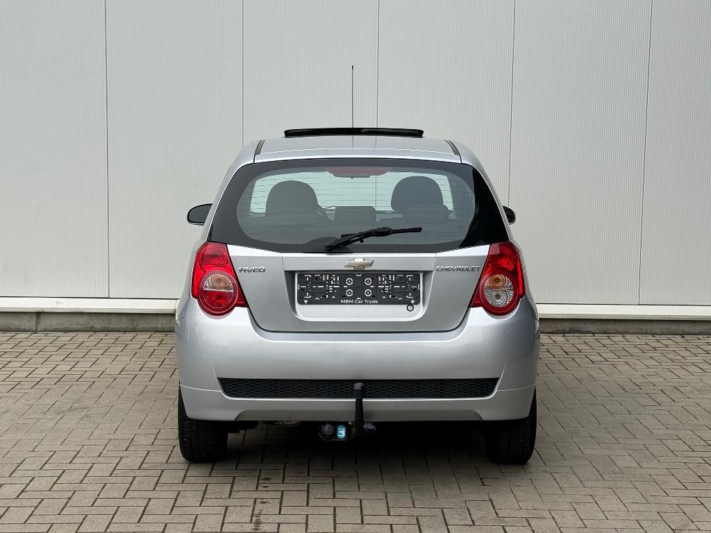 ✅Chevrolet Aveo 1.2 i GARANTIE Airco Trekhaak Open Dak 1.Eig, Auto's, Chevrolet, Voorwielaandrijving, 1206 cc, Stof, 4 cilinders
