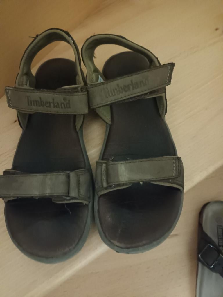 Timberland sandalen, Ophalen