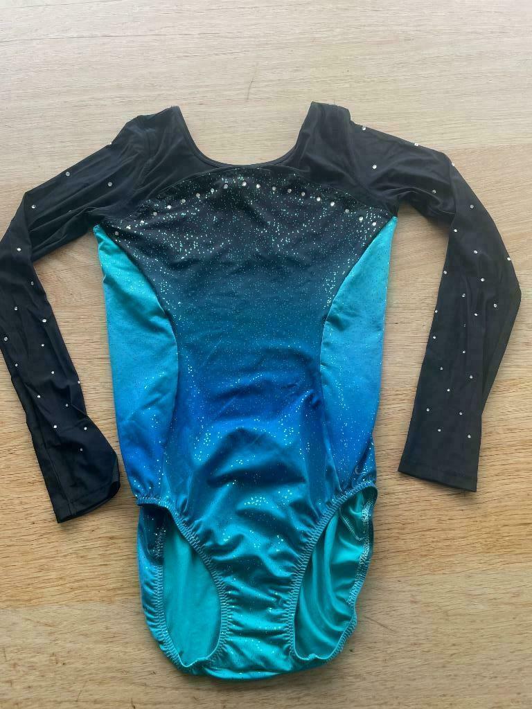 turnpakje 151-160 als nieuw, Kinderen en Baby's, Meisje, Sport- of Zwemkleding, Ophalen of Verzenden, Zo goed als nieuw