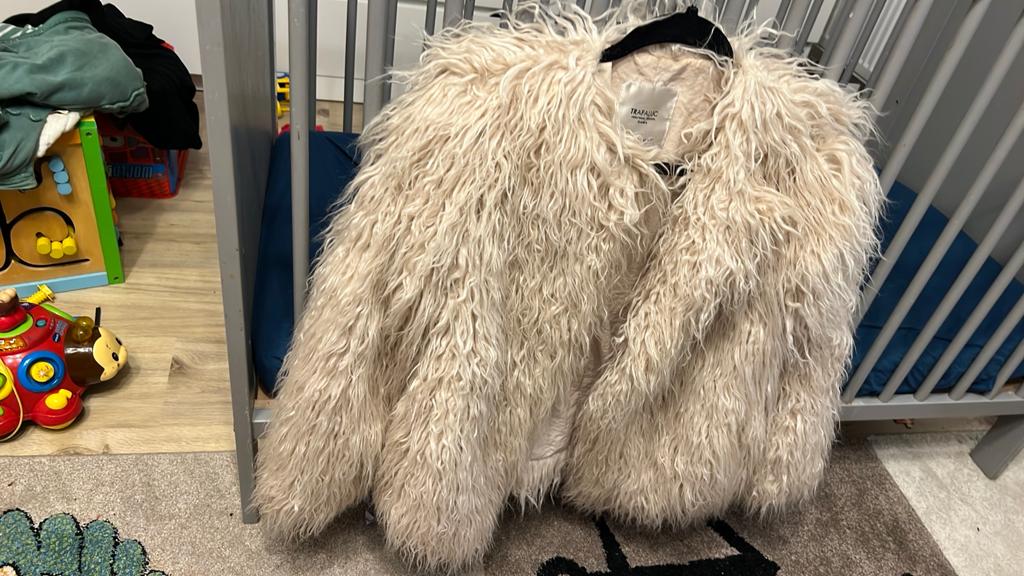 Manteau, Enlèvement, Comme neuf