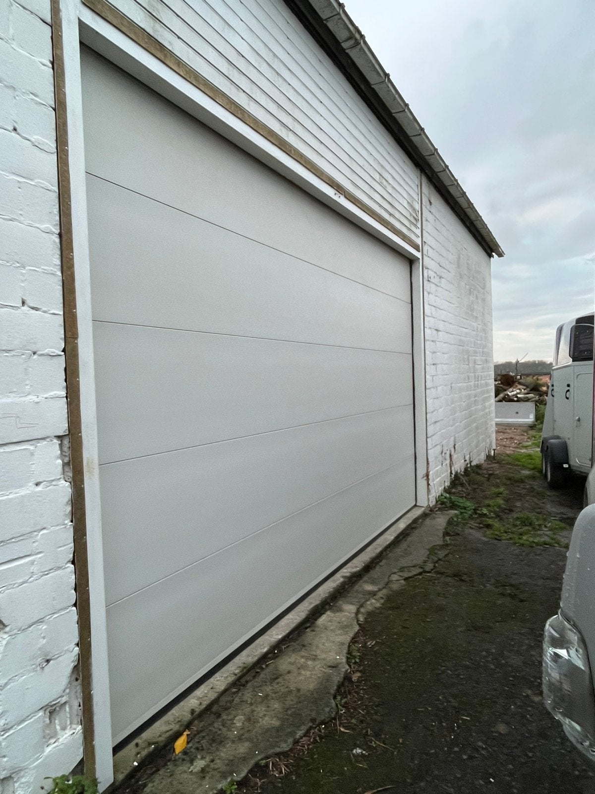 Garagepoort, Ophalen, Zo goed als nieuw