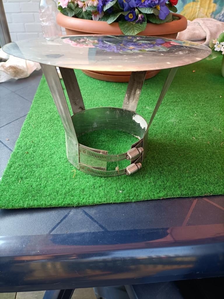 Schoorsteen regenkap, Ophalen