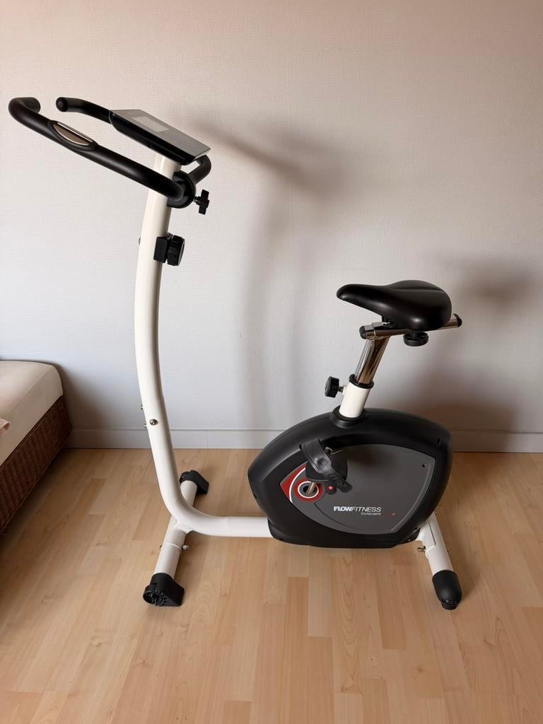 Vélo d'exercice Flow Fitness, Jambes, Comme neuf, Enlèvement, Vélo d'appartement