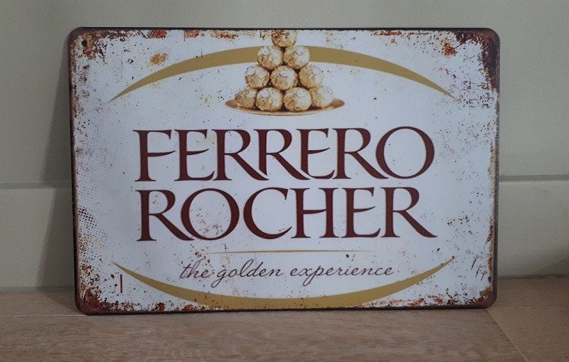 Assiette murale Ferrero Rocher en métal au look vintage, Enlèvement ou Envoi, Neuf, Panneau publicitaire