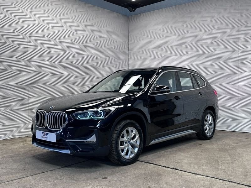 BMW X1 sDrive18i*AUT*SPORTZETELS*XLINE*CAMERA*HUD*, Gebruikt, 136 pk, Zwart, Leder