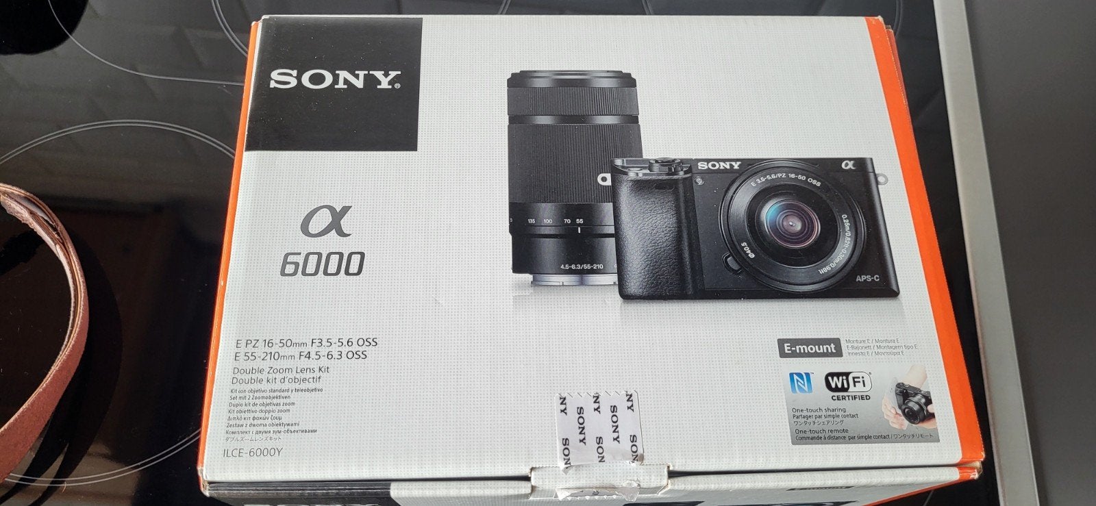 Sony 6000 met telelens, Ophalen of Verzenden, Zo goed als nieuw, Draagriem, Sony