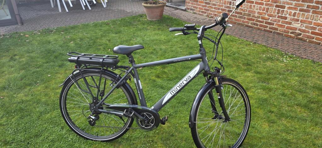 Elektrische Minerva fiets, Fietsen en Brommers, Fietsen | Heren | Sportfietsen en Toerfietsen, Zo goed als nieuw, 26 inch, Ophalen
