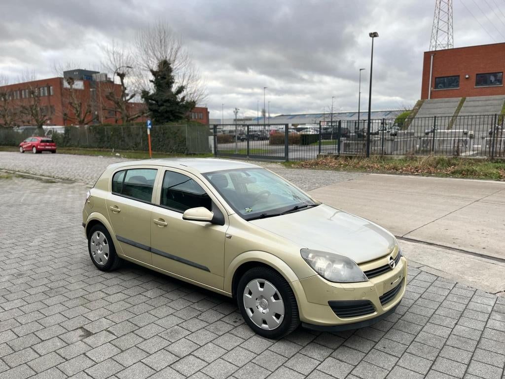 Opel Astra H 1.4i Benzine Airco Export, Auto's, Voorwielaandrijving, Stof, Electronic Stability Program (ESP), Zwart
