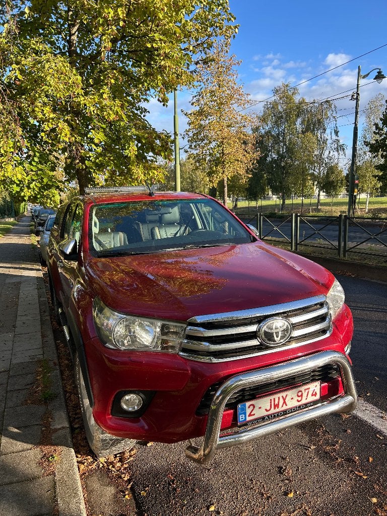 TOYOTA HILUX 2016 ROUGE FULL OPTIONS, Auto's, Automaat, 4 deurs, Leder, Particulier