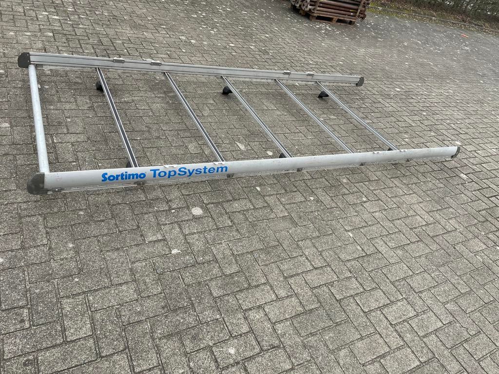 Dakdrager bestelwagen, Ophalen