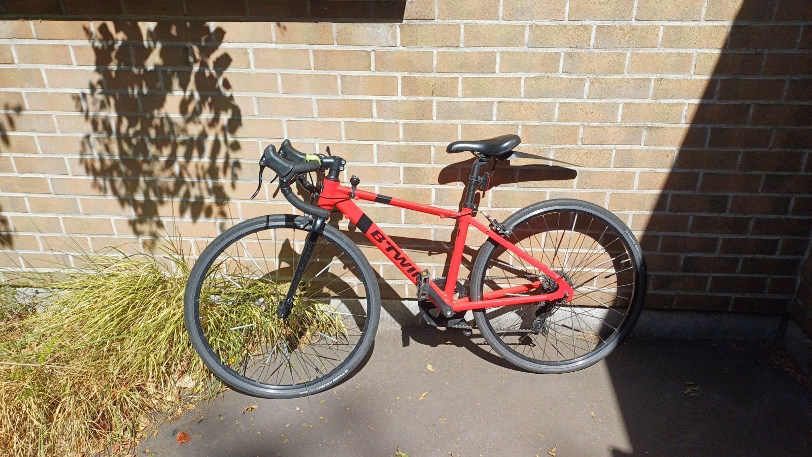Koersfiets kids Btwin Triban 100 25", Fietsen en Brommers, Ophalen, 20 inch of meer, Gebruikt, Velgrem