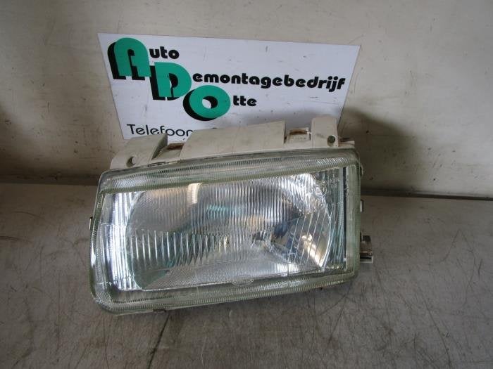 Koplamp links van een Volkswagen Polo (Polo 94-), Auto-onderdelen, Verlichting, Gebruikt, -, Volkswagen, -