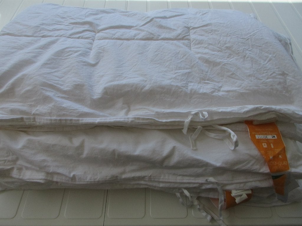 Vierseizoenendekbed voor babybed, Ophalen