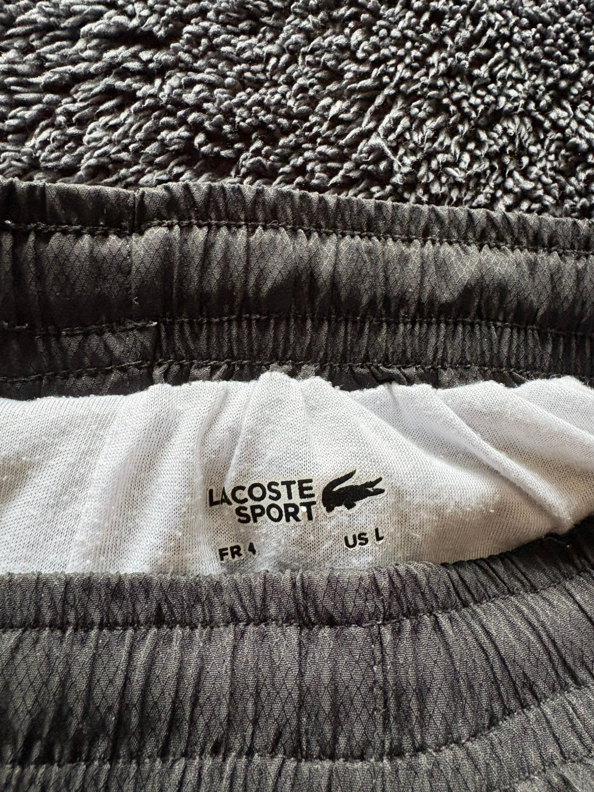 Lacoste sport, Enlèvement, Comme neuf, Taille 52/54 (L), Noir