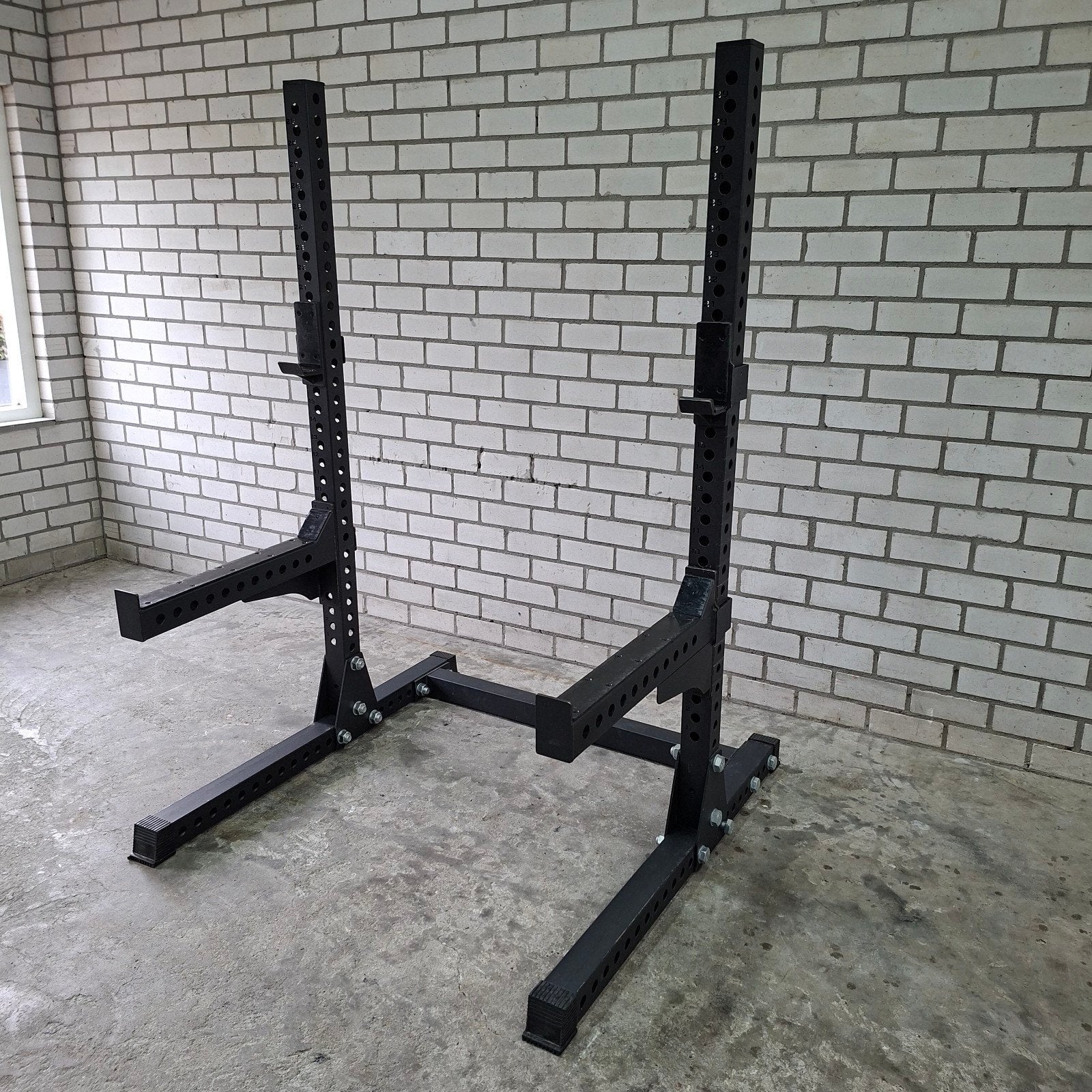 Squat Rack met Verstelbare Spotterarmen en J Hooks, Enlèvement