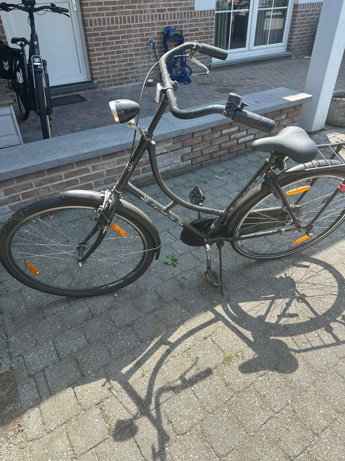 Damesfiets, Ophalen