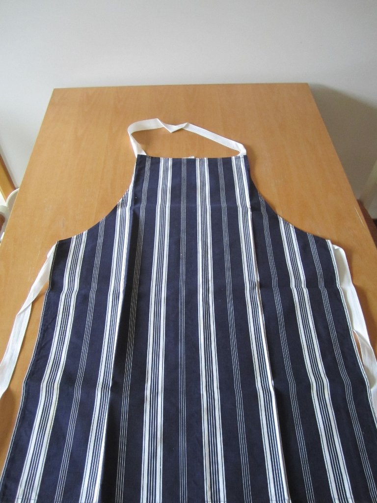 Keukenschort + toque, Huis en Inrichting, Blauw, Ophalen of Verzenden, Zo goed als nieuw, Schort