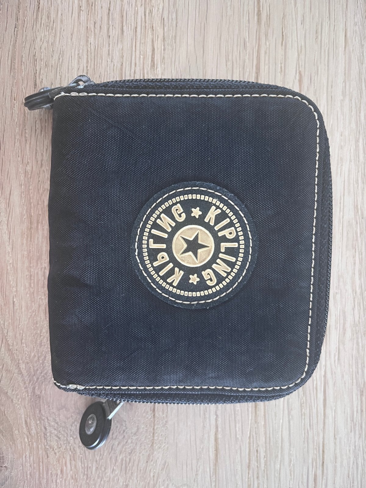 Portefeuille Kipling, Enlèvement, Comme neuf