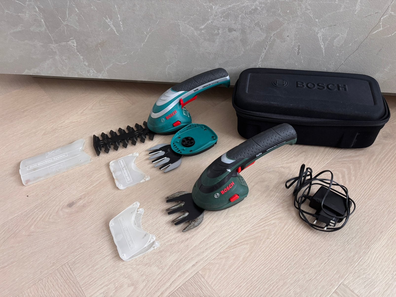 2x verschillende Bosch ISIO Accu Gras- + Struikschaar Set, Ophalen of Verzenden, Zo goed als nieuw, Accu