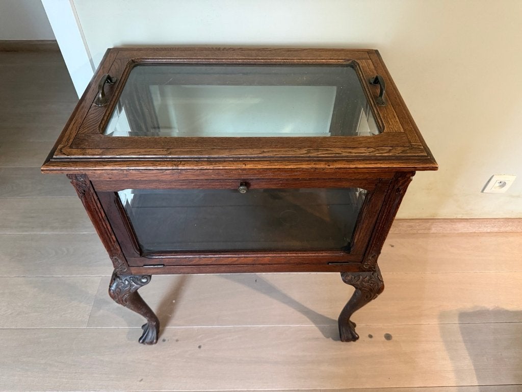 Antieke vitrinetafel, Ophalen
