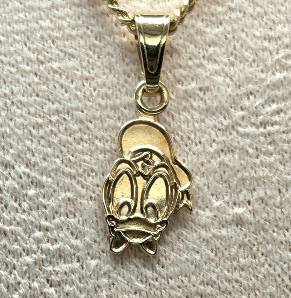 Gouden Donald Duck hanger. 2026/694, Overige voorstellingen, Ophalen of Verzenden, Zo goed als nieuw, Goud