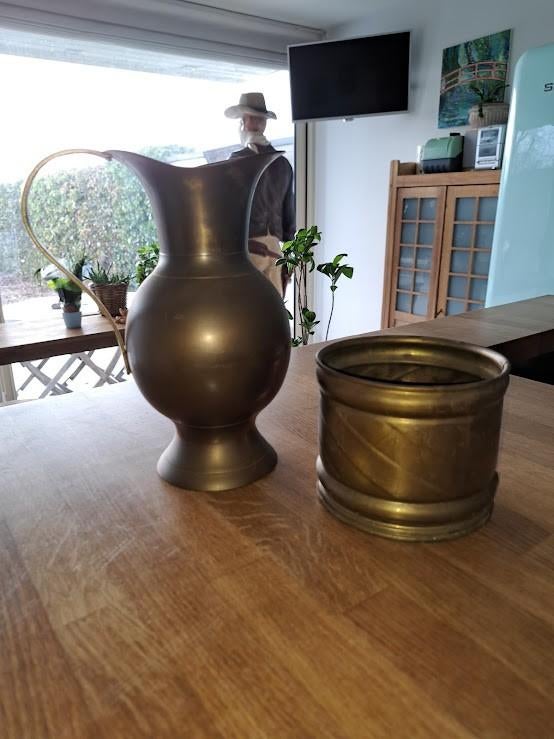 Kan in tin met potje, Ophalen