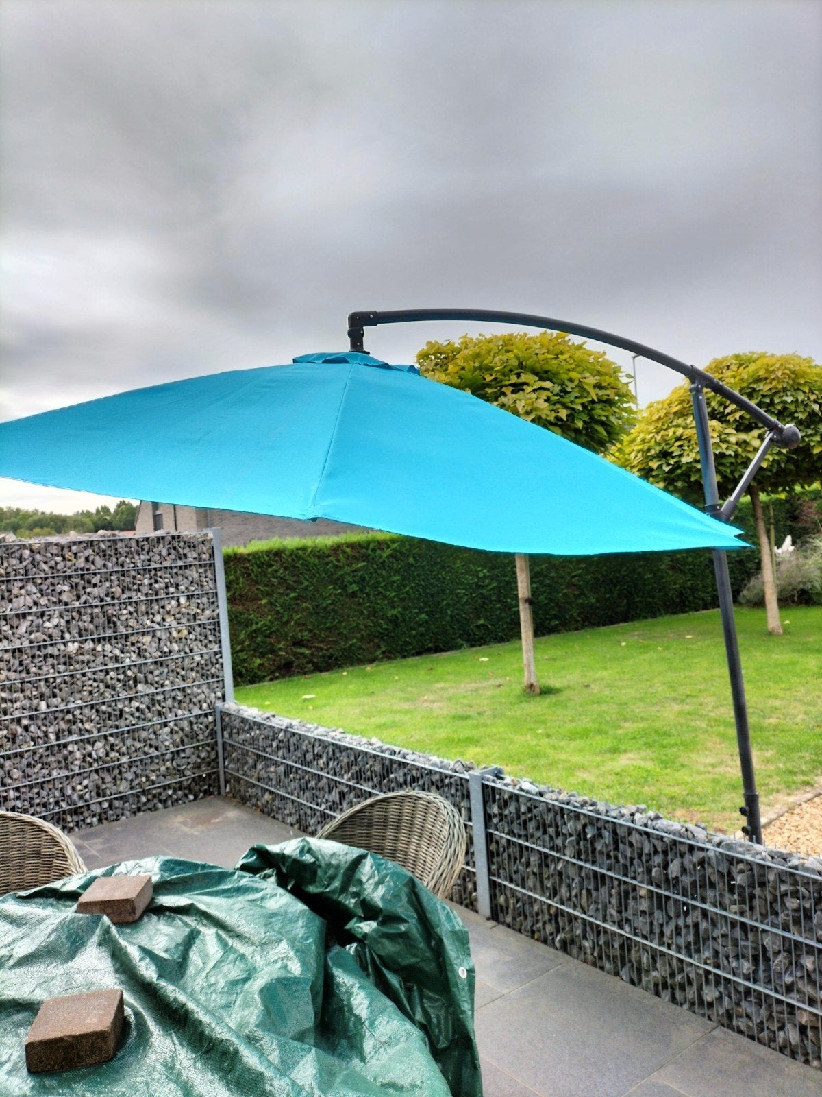 parasol en voet, Ophalen