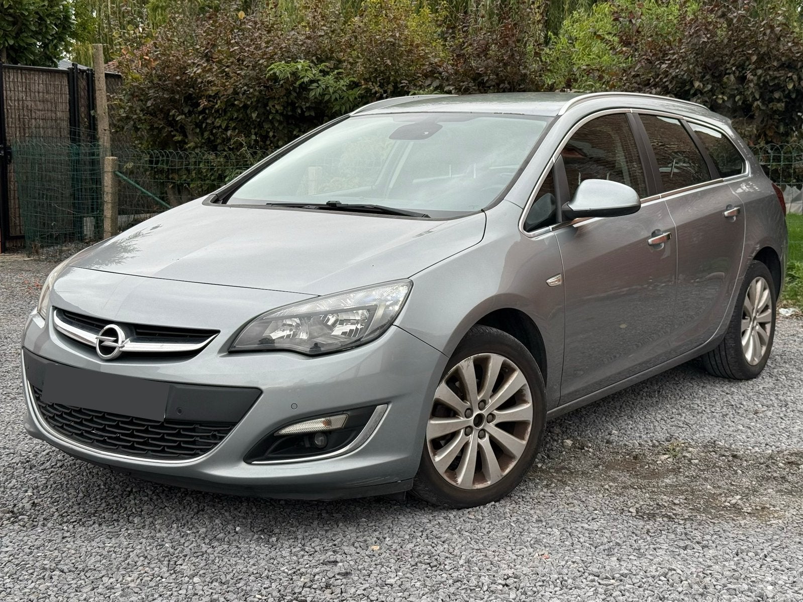 Opel Astra Sport Tourer 1.4 Benzine, Autos, Achat, Boîte manuelle, Entretenue par le concessionnaire, 5 portes