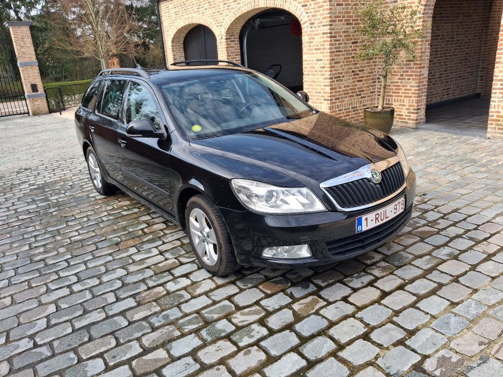 Skoda Octavia Combi zwart diesel, Auto's, Skoda, Particulier, Octavia, ABS, Airbags, Airconditioning, Automatische klimaatregeling
