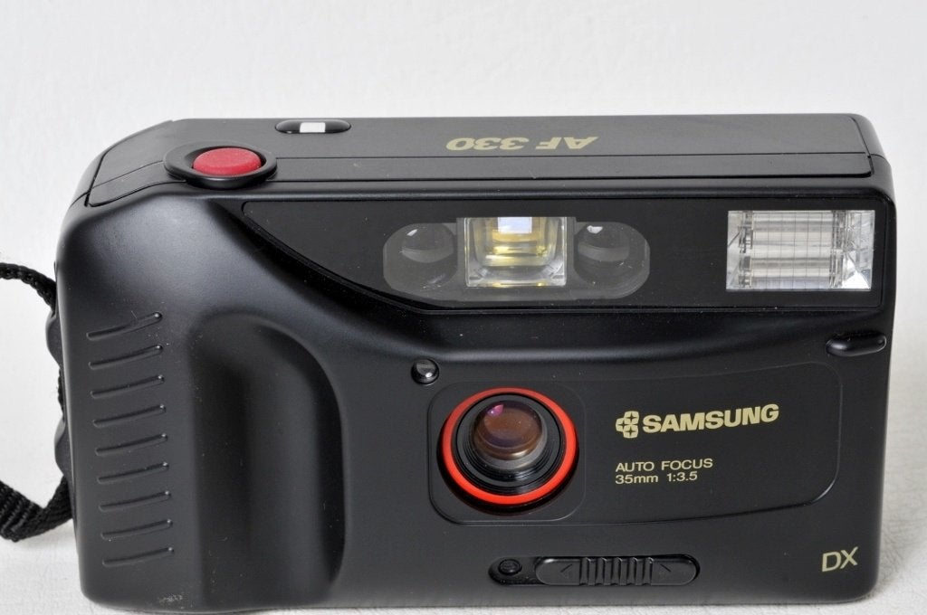 Samsung AF 330 + l’étui ETAT NEUF.    Argentique, TV, Hi-fi & Vidéo, Enlèvement ou Envoi, Comme neuf, Compact, Samsung