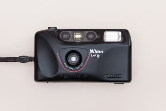 Nikon AF200, Audio, Tv en Foto, Fotocamera's Analoog, Ophalen of Verzenden, Zo goed als nieuw, Nikon