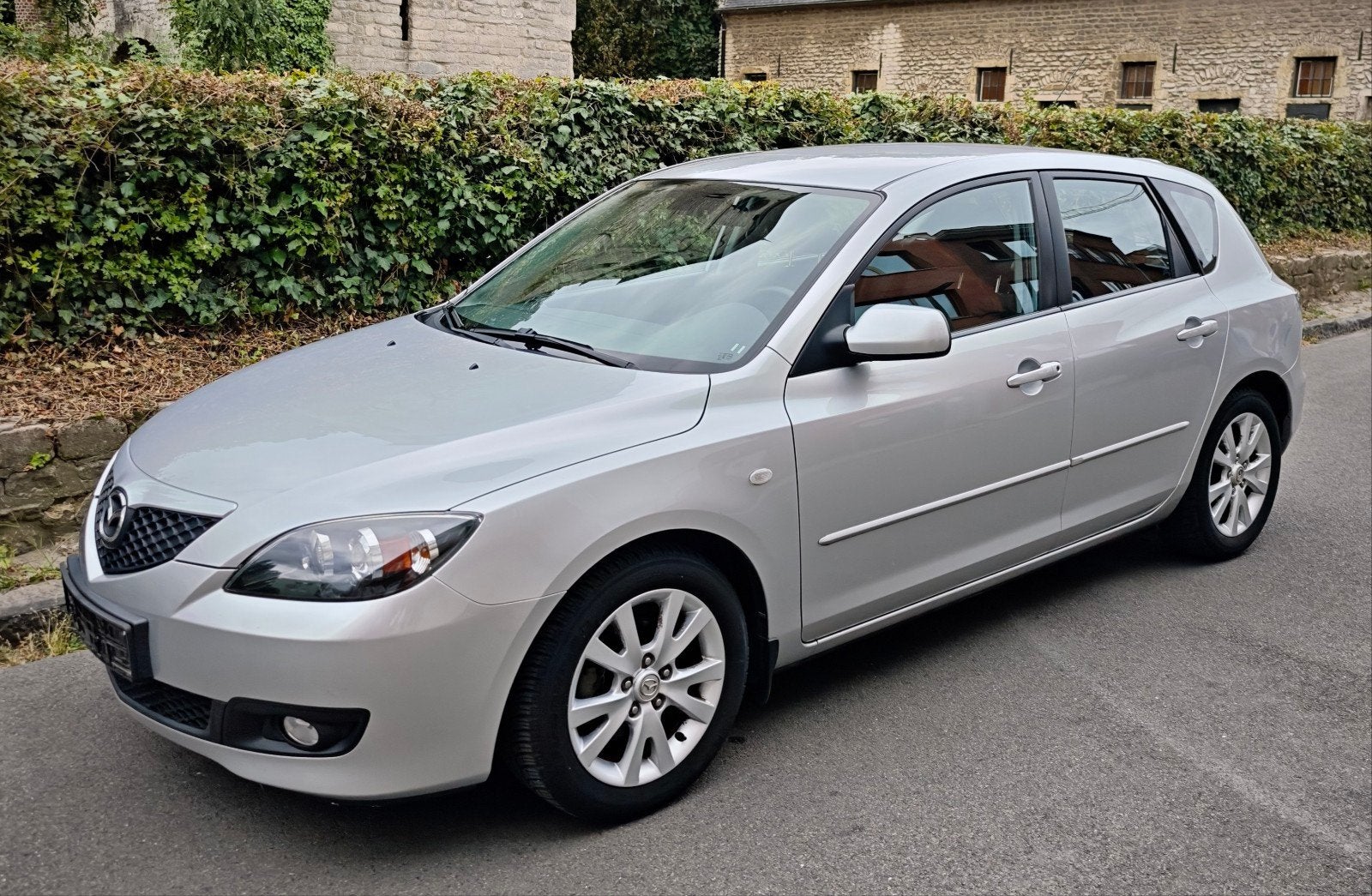 Mazda 3 1.6 MZR Clim Rozeformulier, Voorwielaandrijving, Dealer onderhouden, Zwart, 4 cilinders