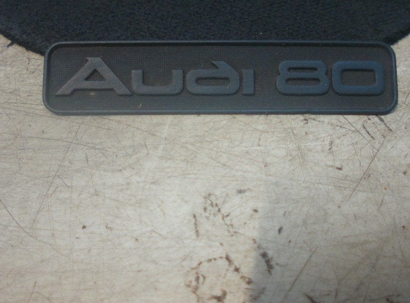 EMBLEEM daschboard embleem Audi 80 1986-1991 (893-853-681), Info@audi.de, Audi, Audi AG, Gebruikt
