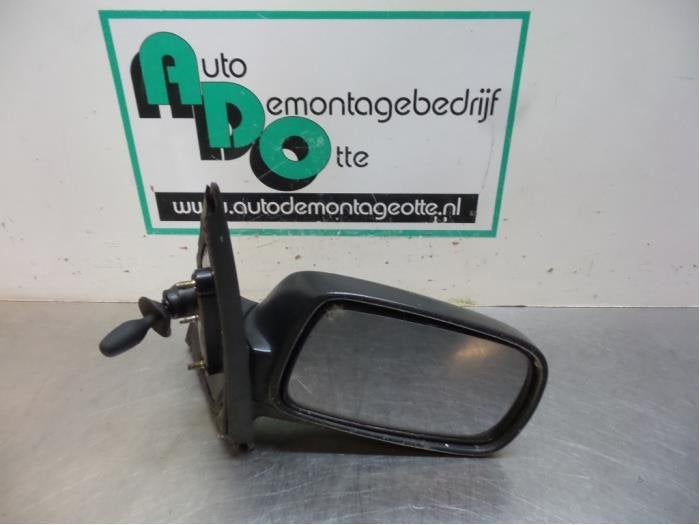 Buitenspiegel rechts van een Toyota Yaris (Yaris 1 00-), Gebruikt, -, -, Ophalen of Verzenden