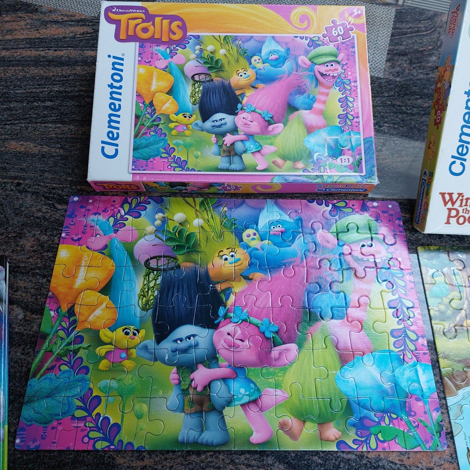 2 kinderpuzzels, Ophalen