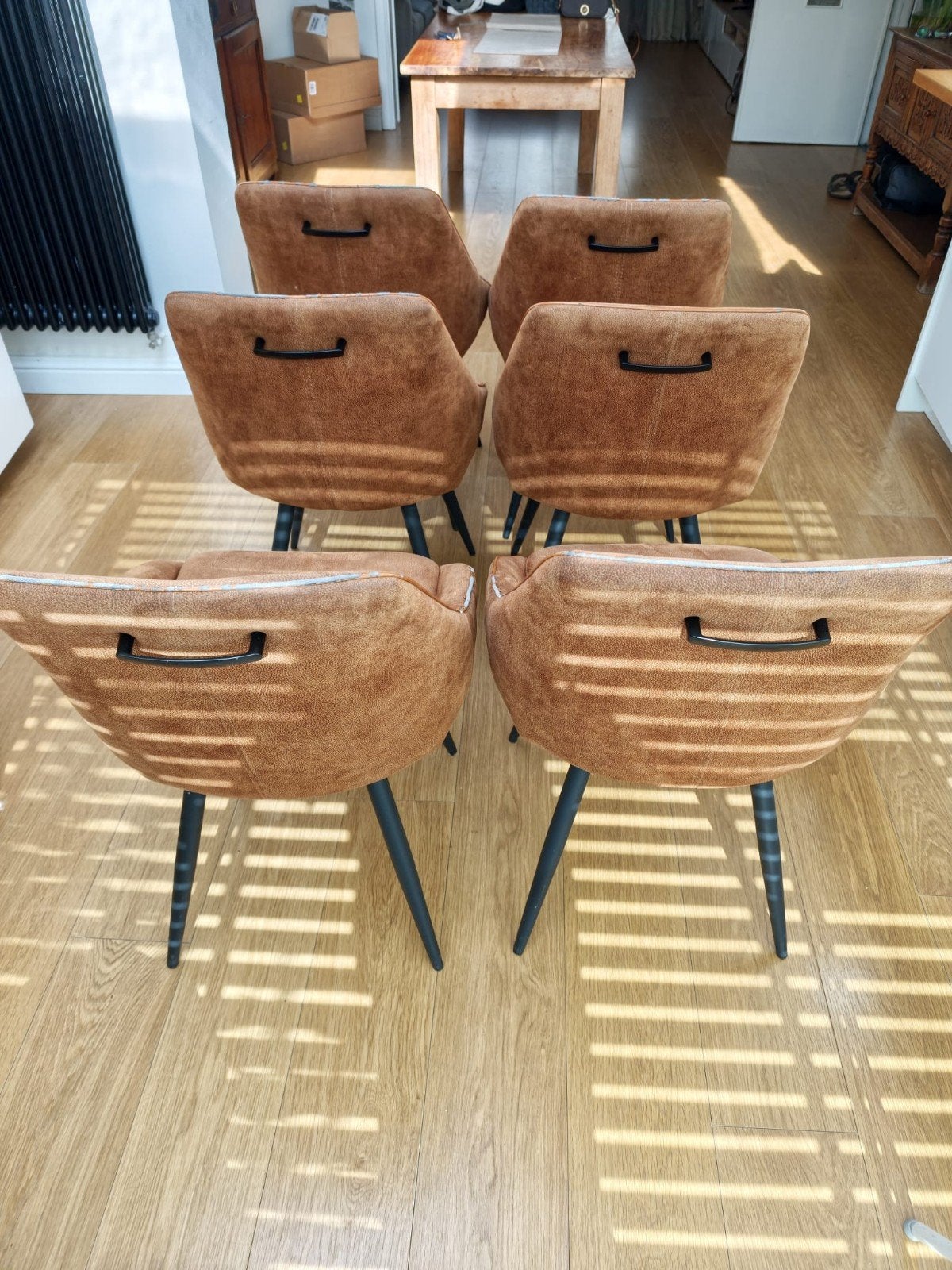 Cognac kleurige kuipstoelen, Ophalen