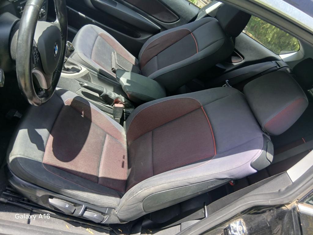 Zwart en rood interieur BMW 1-serie e81 3-deurs compleet met, BMW