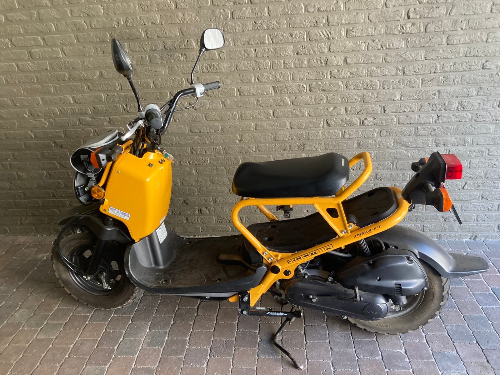 Bromfiets Honda, Fietsen en Brommers, Ophalen, Zo goed als nieuw
