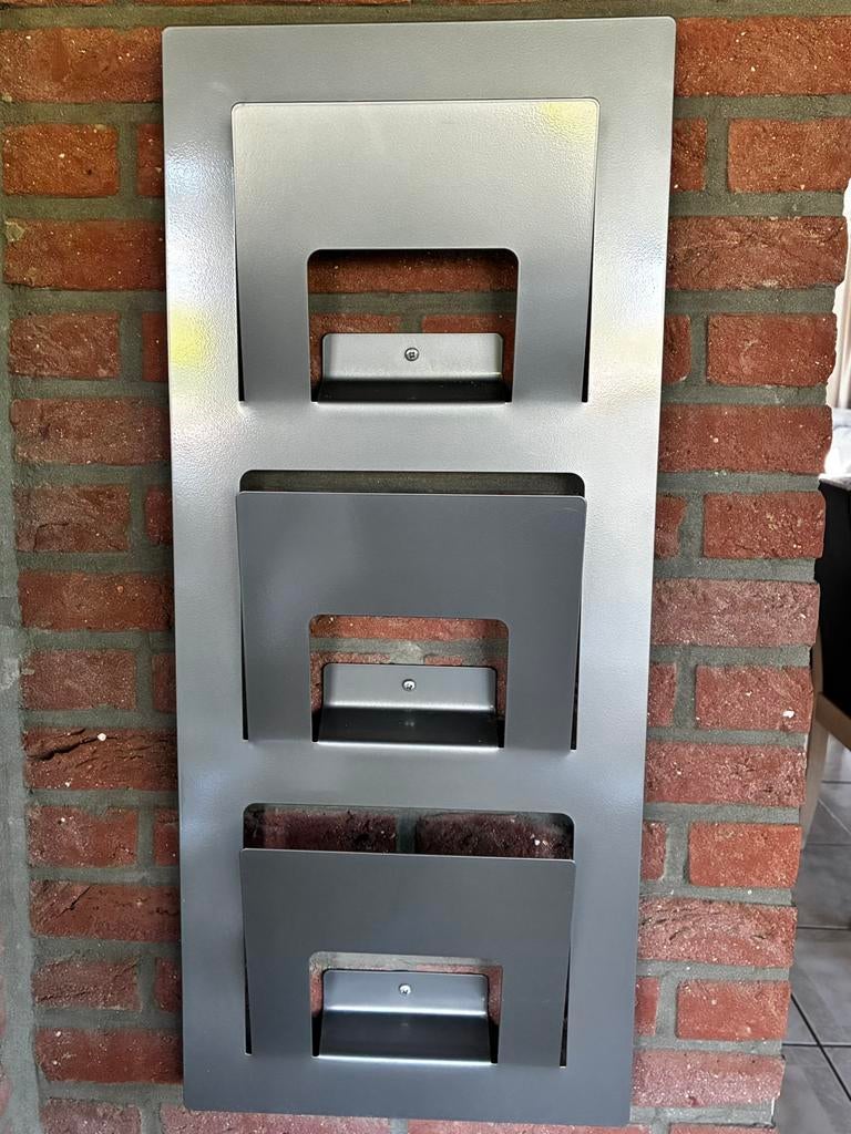 Mobiele en vaste krantenhouder, Enlèvement, Utilisé