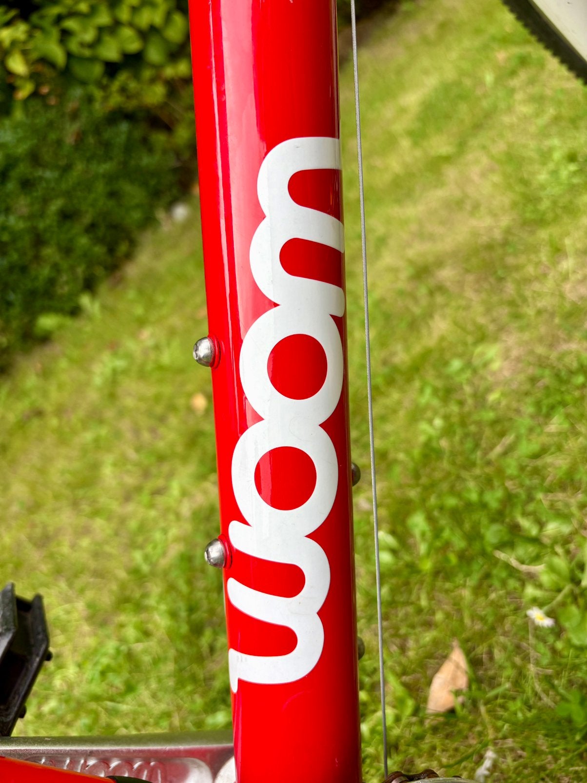 Kinderfiets - Woom 4 - Rood (nieuwprijs: EUR 602,90), Ophalen, Zo goed als nieuw, Velgrem, 20 inch of meer