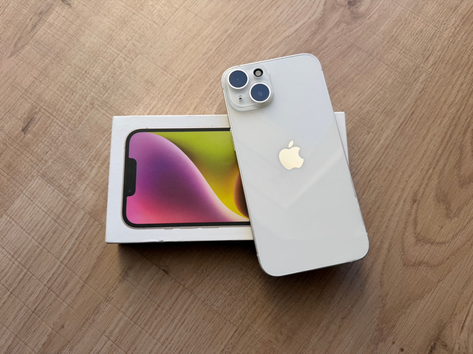 iPhone 14 128 Go blanc - Batterie à 100 % - État neuf, 128 GB, Comme neuf, Enlèvement, Sans abonnement