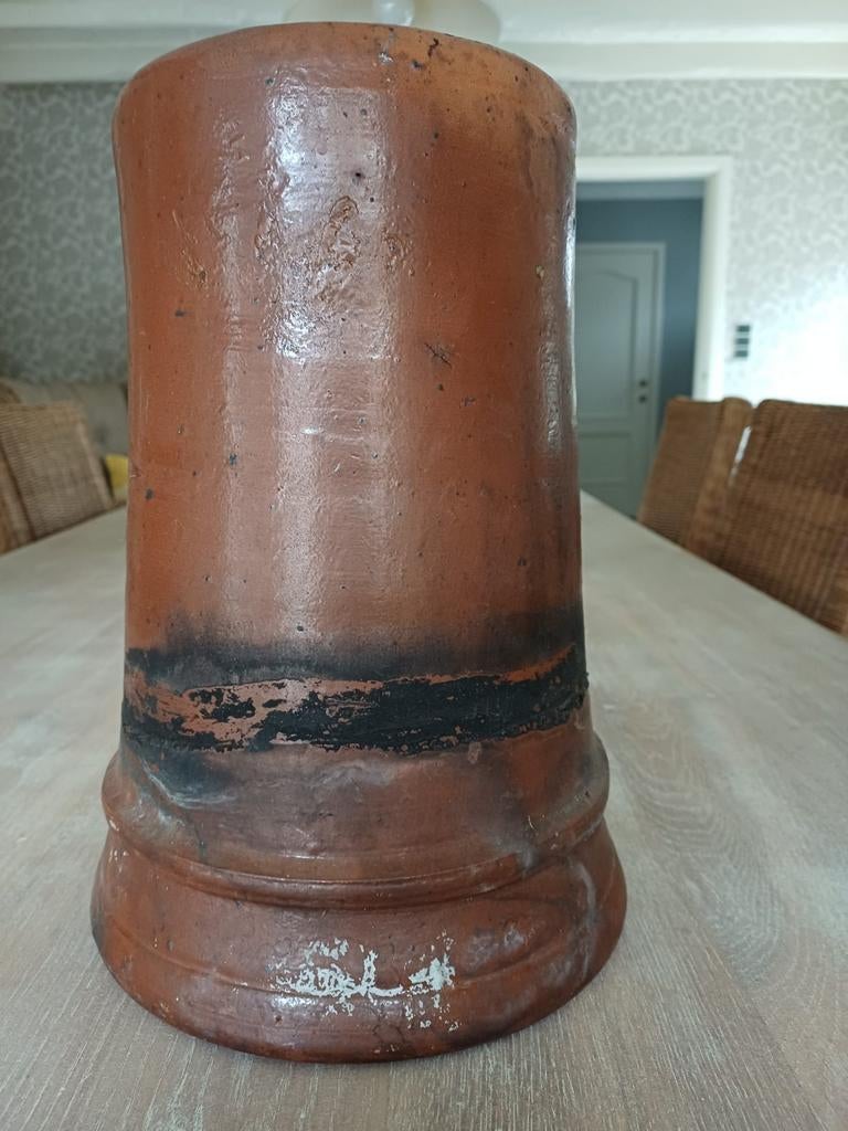 Oude schoorsteenpot, Ophalen