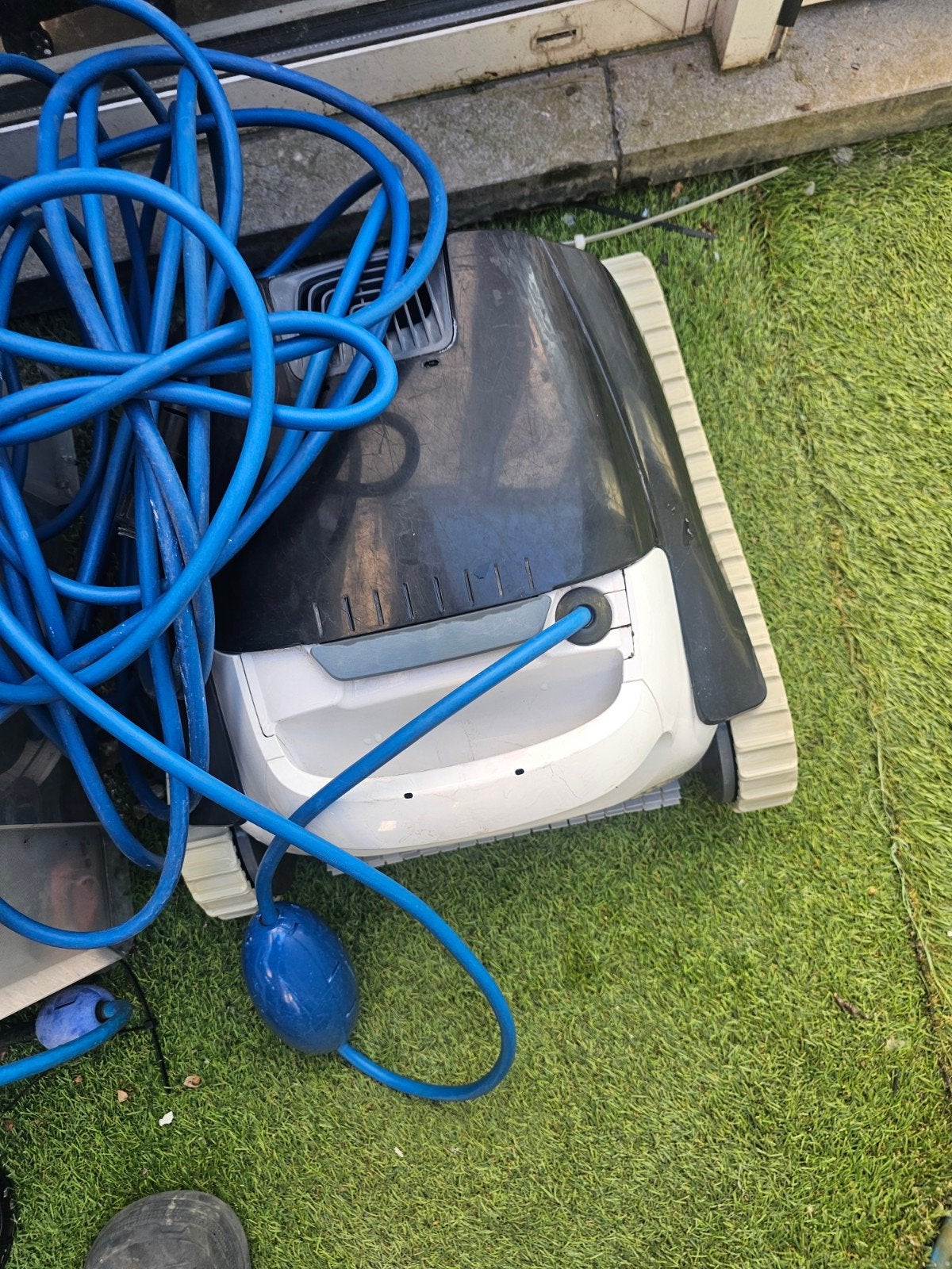 zwembadrobot dolphin, Ophalen