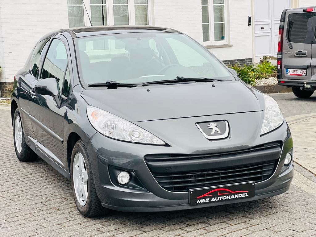 Peugeot 207 1.4i Benzine * 128.000 Km * 2011 * Pano dak, Autos, Euro 5, Achat, Entreprise, Capteur de lumière