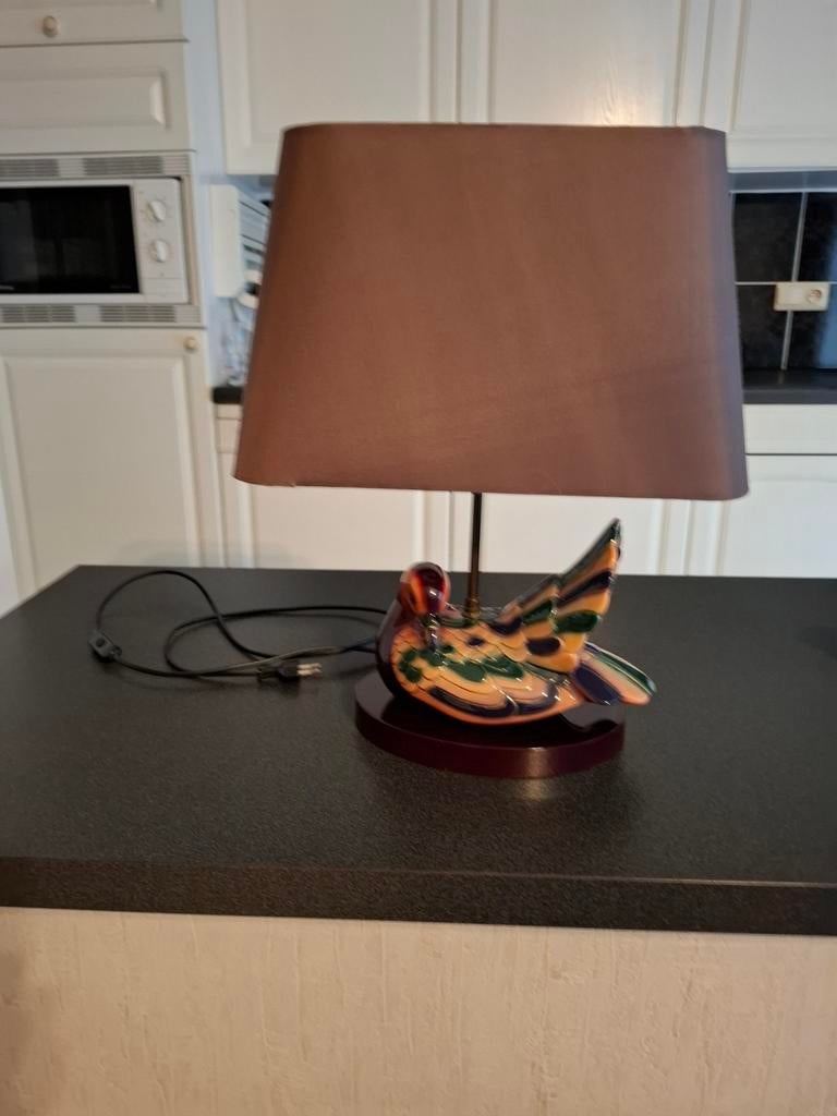 Eenden lamp, Ophalen