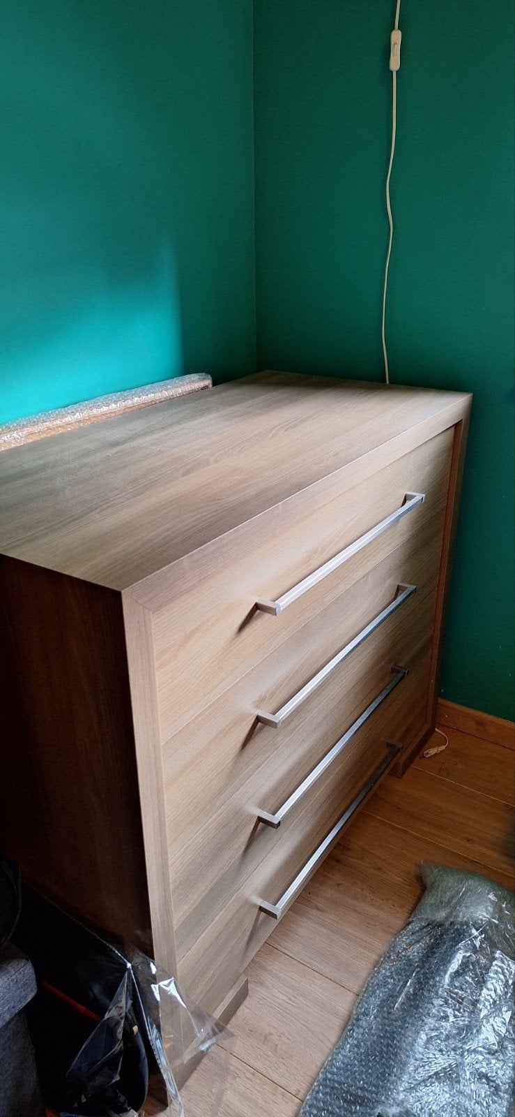 commode 4 lades, Ophalen