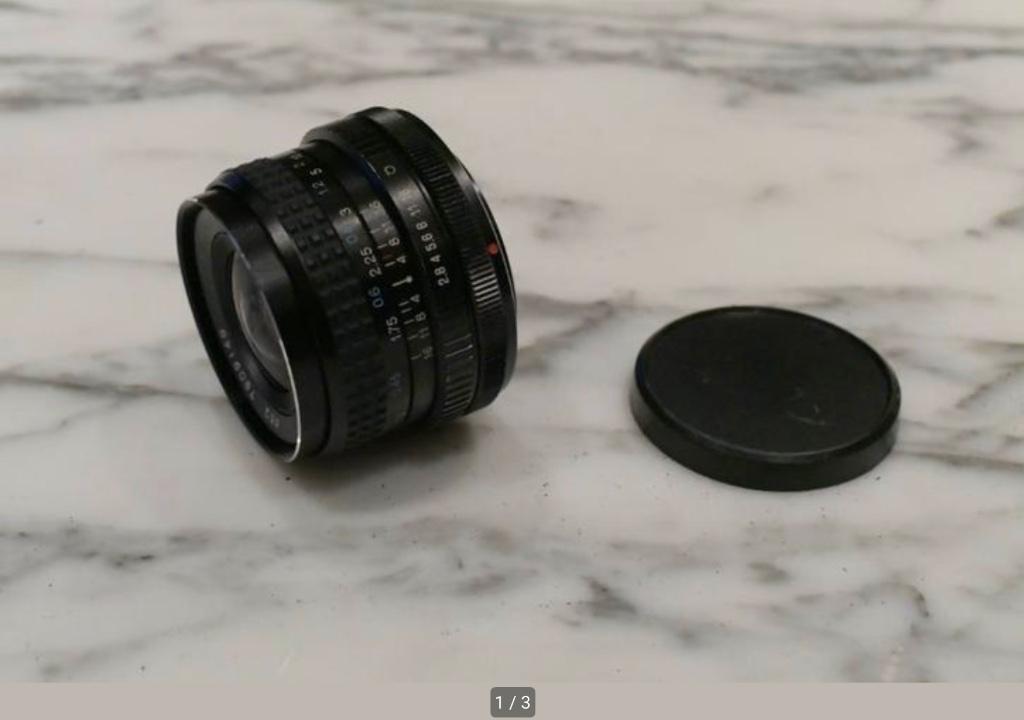 Tokina RMC 28 mm/f/2,8 pour Canon FD, Enlèvement ou Envoi, 1980 à nos jours, Lentille ou Lentilles
